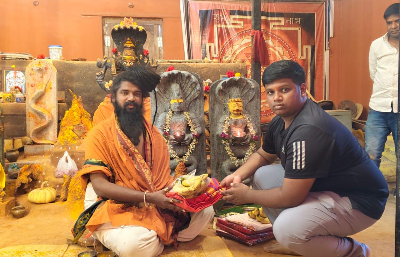 Receiving an offering in the temple
